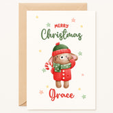 Christmas card with a bunny  illustration wearing a red coat and green hat, holding a candy cane, with 'Merry Christmas Grace' text.